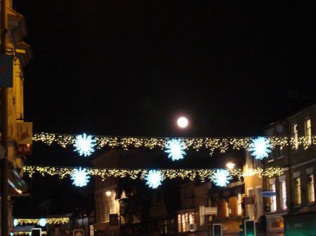 full moon and Christmas lights